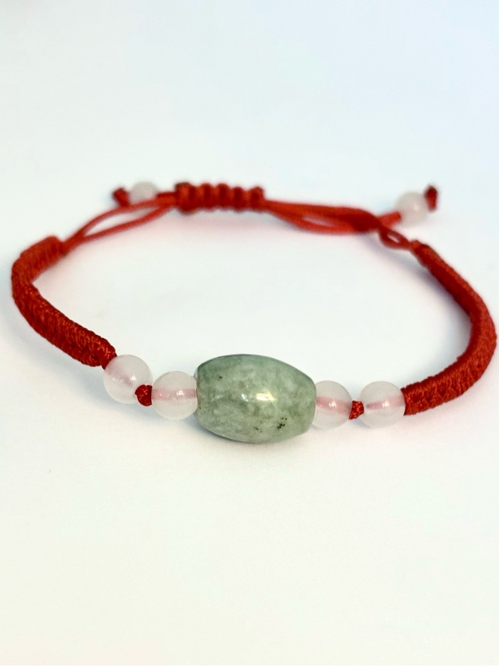 Pretty handwoven, 7, stone, adjustable Jade bracelet.